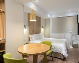 Hotel Relax II - טאיפיי - חדר שינה