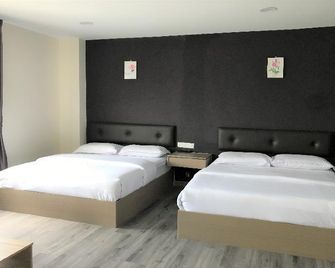 OYO 90506 Z Stay Inn Hotel - Kluang - Bedroom