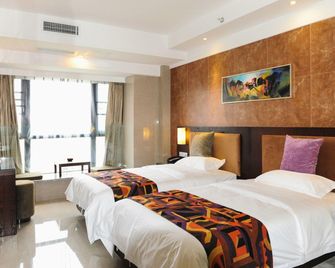 9 هوتل - تشنغدو - غرفة نوم