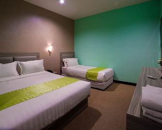 جرينلاند هوتل باتام - باتام كوتا - غرفة نوم