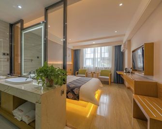Suzhou Hotel - Jiuquan - Slaapkamer