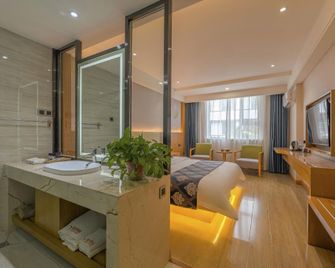 Suzhou Hotel - جيوتشيوان - غرفة نوم