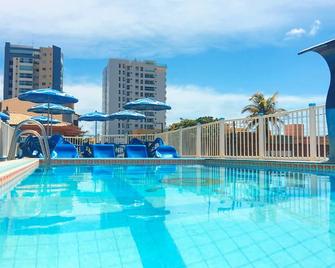 Pousada Raio de Sol - אראקאז'ו - בריכה