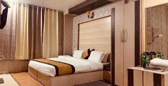 Hotel Imperial9 - דרמאסאלה - חדר שינה
