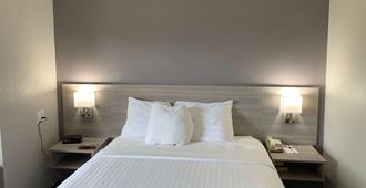Microtel Inn & Suites by Wyndham Charlotte Airport - Charlotte - Camera da letto