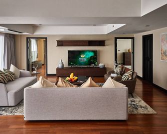 Floral Court Hotel & Residence Sukhumvit 13 - Bangkok - Living room