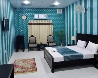 Royal City Hotel Sahiwal - Sahiwal - Bedroom