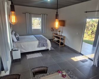 Chalés Recanto da Baleia - אלטו פאראיסו דה גויאס - חדר שינה