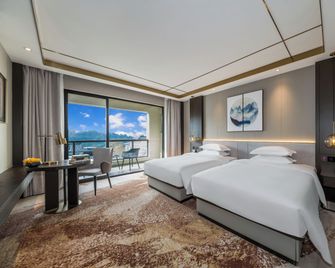 Poltton Century Hotel - Changtai Taoli Chunfeng Branch - Zhangzhou - Slaapkamer