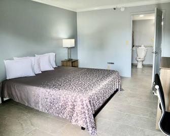 Home Inn & Suites Orlando-Apopka - Apopka - Bedroom