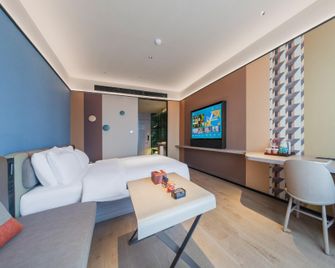 Orange Hotel Rizhao University Town Shanhaitian Resort - Rizhao - Ložnice