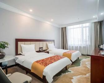 Xining Jufang Hotel (No.1 Vocational School Branch) - Xining - Bedroom