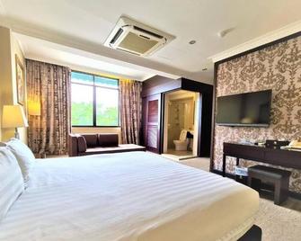 Merdeka Hotel - Kluang - Camera da letto