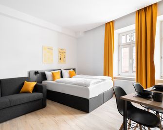 Servus Apartments by Homaris - München - Schlafzimmer