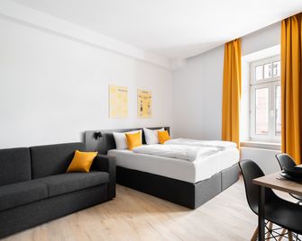 سيرفوس أبارتمنتس باي هوماريس - ميونخ - غرفة نوم