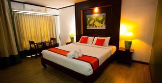 Chour Palace Hotel - Mae Sai - Bedroom