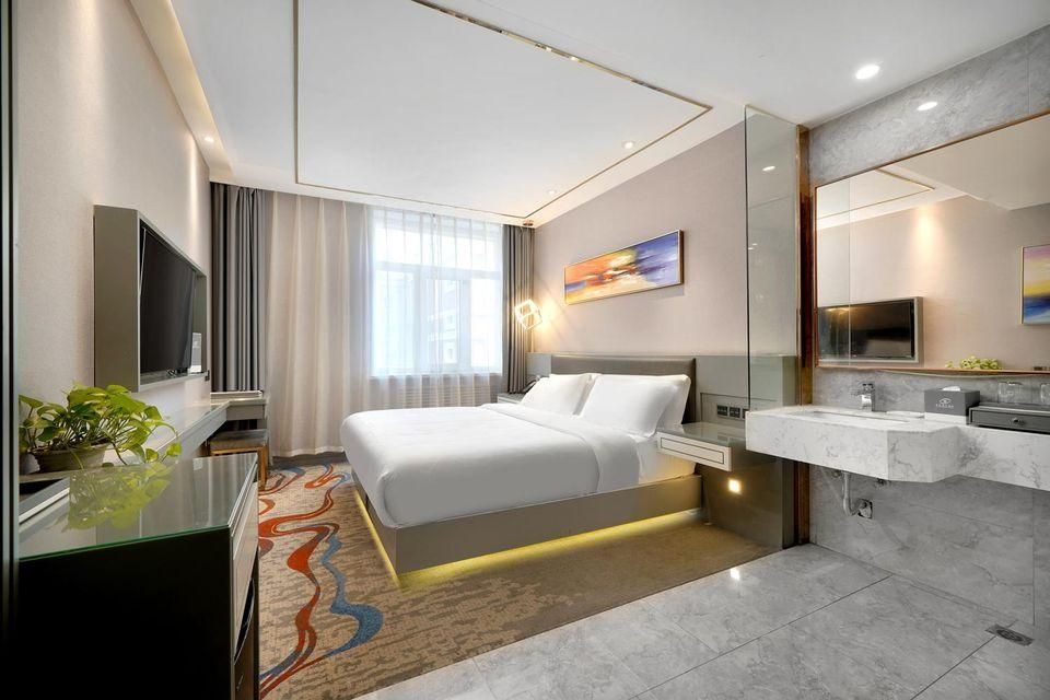 Harbin Gfour Holiday Hotel - هاربين - غرفة نوم