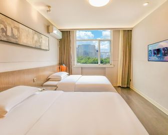 Jinjiang Inn Select Taiyuan Pingyang Road Branch - Taiyuan - Slaapkamer
