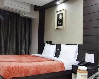 Hotel Okasu - Raipur - Schlafzimmer