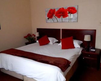 Oak Rest Guesthouse - Kimberley - Schlafzimmer