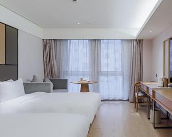 Ji Hotel Shanghai Hongqiao Wuzhong Road - Shanghai - Makuuhuone