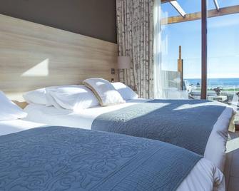 Hotel y Cabañas Campanario - לה סרנה - חדר שינה