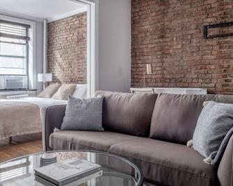 Unbelievable West Village 1BR w/ In-Unit W/D, by Blueground - New York - Living room