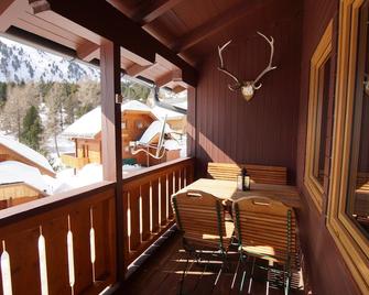 Well-being hut on the mountain pasture for relaxing in the mountains with sauna, all year round. aim - Falkert - Balcony