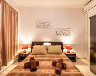 Spinola Bay Apartment by Getaways Malta - San Ġiljan - Schlafzimmer