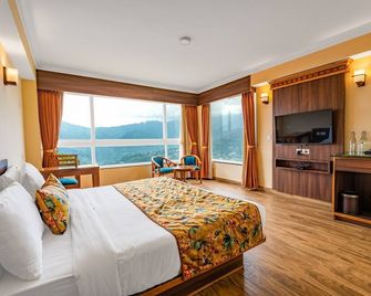 Summit Namnang Courtyard & Spa - גנגטוק - חדר שינה