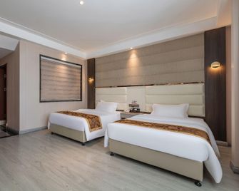 Jingkainan International Apartment - Wuhan - Habitación