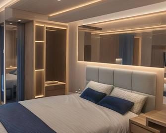 غراندبوتيك-إن - جاكرتا - غرفة نوم