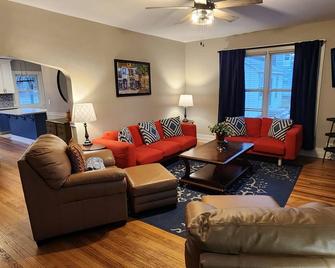 The Main Event Game House on the Huntley Square! - Huntley - Living room