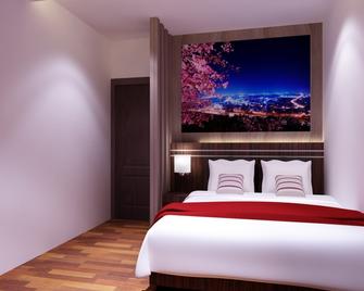 Neotel Hotel City Centre - Tanjung Redeb - Bedroom