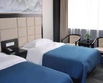 Nanfang Hotel Anban Street - שי-אן - חדר שינה