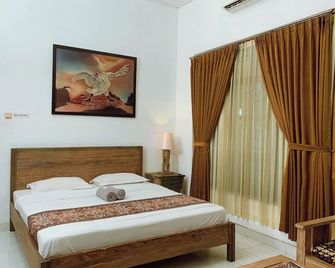 Griya Cemara Homestay - Yogyakarta - Bedroom