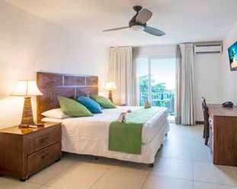 Paradise Oceanic Hotel - West Bay - Bedroom