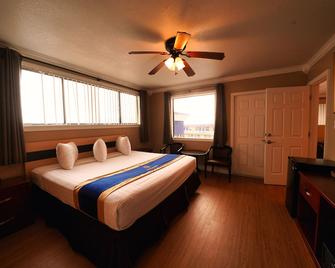 Sandals Inn - Daytona Beach - Schlafzimmer