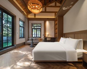 Shanghai Jiading Villa Garden Hotel - שנחאי - חדר שינה