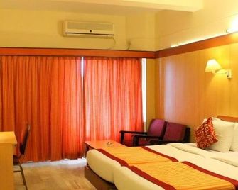 Hotel Yasodha Towers - Hosūr - Bedroom