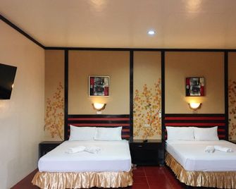 RedDoorz @ Mountain Citi Tourist Inn Canlaon - San Carlos - Habitación