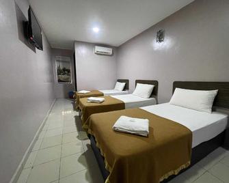 OYO 91119 Hotel D'Lima Inn Langkawi - Kuah - Slaapkamer