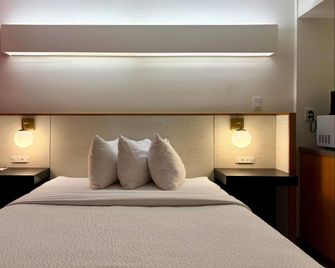 Ramada Limited Bloomington Il I-74/I-55 - בלומינגטון - חדר שינה