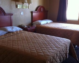 A1A Travel Inn - אורמונד ביץ' - חדר שינה