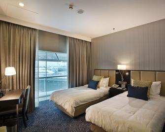 Ambassador Transit Hotel - Terminal 3 - Singapore - Camera da letto