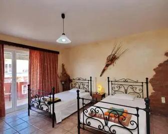 Aphrodite studios - Loutra Edipsou - Schlafzimmer