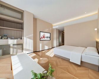 Dayuhaitang Homestay (Harbin Central Avenue, Harbin Songhuang River Highway Bridge Subway Station) - Harbin - Bedroom