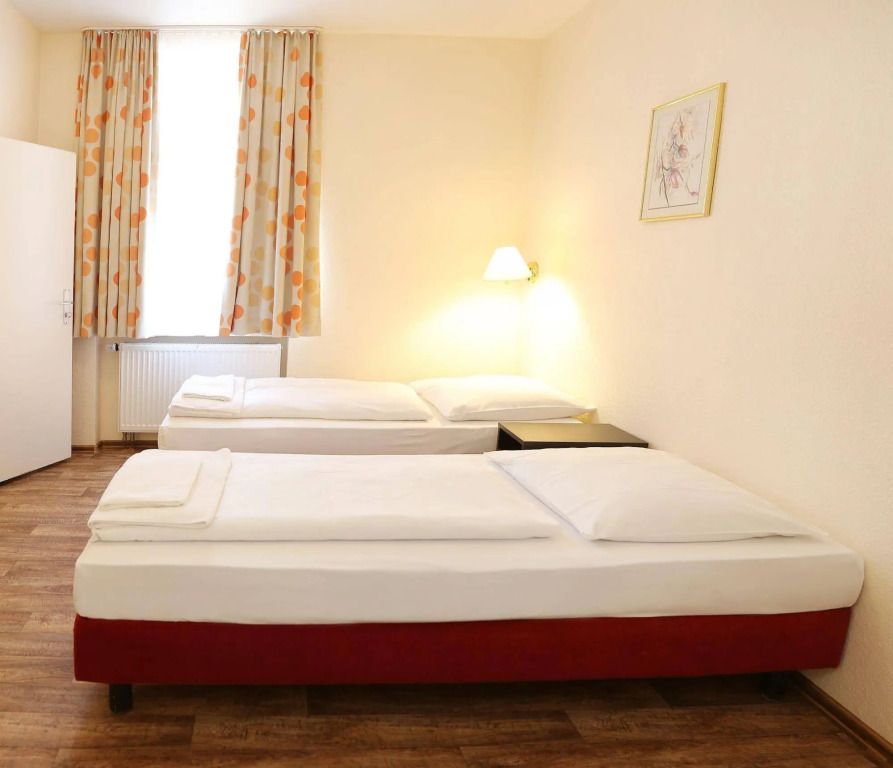 بنسيون ألفا فرانكفورت سيتي - فرانكفورت ام ماين - غرفة نوم