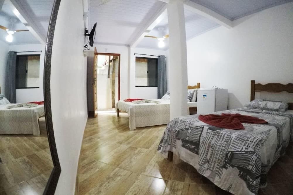 Suítes Cantinho da Pedra - Vila do Abraao - חדר שינה