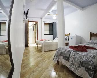 Suítes Cantinho da Pedra - Vila do Abraao - חדר שינה